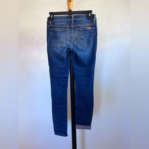 Joe’s jeans. Worn but in good condition.